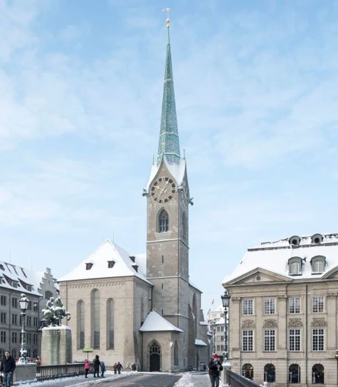 Fraumunster in Zurich with a luxury car
